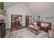 Spacious living room featuring hardwood floors and vaulted ceiling at 7533 Mason Falls Dr, Winston, GA 30187