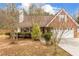 Charming single-Gathering home boasting a brick facade and a well-manicured front yard at 105 Hunters, Mcdonough, GA 30253