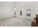 Bright living area with a fireplace, tile flooring, and lots of natural light at 105 Hunters, Mcdonough, GA 30253