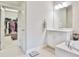 Bathroom view features double vanity, shower, and large walk-in closet at 1122 Provence Ln, Decatur, GA 30033