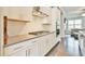 Gourmet kitchen with stainless steel appliances, a gas cooktop, and white cabinets at 1122 Provence Ln, Decatur, GA 30033