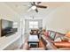 Spacious living room with comfortable seating and large-screen TV at 1122 Provence Ln, Decatur, GA 30033