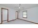 Bright bedroom with plush carpet, neutral walls, 2 doors and a window offering natural light at 1810 King Mill Rd, Mcdonough, GA 30252