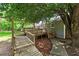 Expansive wooden deck and walkway to the side of a gray home at 1810 King Mill Rd, Mcdonough, GA 30252