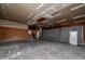 Large garage with multiple bays, ceiling fans, and ample space for vehicles and storage at 1810 King Mill Rd, Mcdonough, GA 30252
