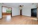 Inviting living room features light hardwood floors and an open concept to the rest of the house at 1810 King Mill Rd, Mcdonough, GA 30252