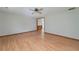 Inviting living room featuring light hardwood floors, neutral walls, and recessed lighting at 1810 King Mill Rd, Mcdonough, GA 30252