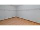 Spacious walk-in closet with wood floor and ample shelving ready to be organized with all your items at 1810 King Mill Rd, Mcdonough, GA 30252