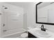Bright bathroom showcasing a shower-tub combo and a modern vanity with sink at 1823 Devon Dr # 1823, Atlanta, GA 30311