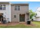 Townhouse's backyard featuring a back patio and green space at 1823 Devon Dr # 1823, Atlanta, GA 30311