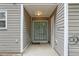 Back patio with sliding glass door in a home with siding at 1823 Devon Dr # 1823, Atlanta, GA 30311