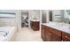 Bright bathroom with double vanity, soaking tub, and separate shower at 1946 Jeffery Nw Rd, Atlanta, GA 30318