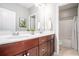 Dual sink bathroom with modern fixtures and a shower at 1946 Jeffery Nw Rd, Atlanta, GA 30318