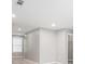 This is a bright bedroom with gray walls, carpet flooring, and a window letting in natural light at 1946 Jeffery Nw Rd, Atlanta, GA 30318