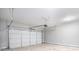 A clean and empty two car garage featuring a white garage door at 1946 Jeffery Nw Rd, Atlanta, GA 30318