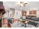 Cozy living room featuring hardwood floors, a stone fireplace, and an open floor plan at 1946 Jeffery Nw Rd, Atlanta, GA 30318