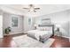 Serene bedroom showcases tray ceilings, plush carpeting, and generous natural light at 1946 Jeffery Nw Rd, Atlanta, GA 30318