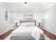 Comfortable main bedroom with a plush bed, stylish decor, and a serene atmosphere at 1946 Jeffery Nw Rd, Atlanta, GA 30318