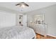 Bright bedroom featuring hardwood floors and a closet at 361 Sarah Ln, Lawrenceville, GA 30046