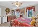 Bedroom with ceiling fan, two windows and traditional furnishings at 361 Sarah Ln, Lawrenceville, GA 30046