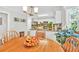 Bright dining area with views of the kitchen and natural light at 361 Sarah Ln, Lawrenceville, GA 30046
