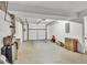 Spacious garage featuring a white garage door at 361 Sarah Ln, Lawrenceville, GA 30046
