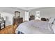 Spacious primary bedroom with hardwood floors, natural light, and tasteful decor at 361 Sarah Ln, Lawrenceville, GA 30046