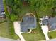 Aerial view of the estate featuring lush landscaping, mature trees and circular driveway at 1235 Grand View Se Dr, Smyrna, GA 30126