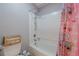 Bathroom with shower-tub combo and a colorful curtain at 2015 Wingate Way, Atlanta, GA 30350