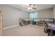 Bedroom showcasing carpet, a ceiling fan and ample natural light at 2015 Wingate Way, Atlanta, GA 30350