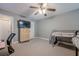 Neutral bedroom featuring a bunk bed, TV atop chest of drawers, and ceiling fan at 2015 Wingate Way, Atlanta, GA 30350