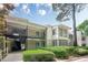 Inviting condo with covered parking, balcony, and a lovely screened-in porch at 2015 Wingate Way, Atlanta, GA 30350