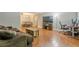 Open concept living area with a dining area, hardwood floors, and sliding doors to the outdoor patio at 2015 Wingate Way, Atlanta, GA 30350