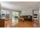 Spacious living room with hardwood floors, a large window, and comfortable seating at 2015 Wingate Way, Atlanta, GA 30350