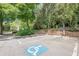 Designated accessible parking space near lush greenery and the building's entrance at 2015 Wingate Way, Atlanta, GA 30350