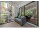 Screened-in patio provides a relaxing outdoor space with views of nature and access to the interior at 2015 Wingate Way, Atlanta, GA 30350
