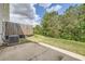 Backyard featuring a grassy area, wooded fence and concrete patio at 3070 Fareed St, Douglasville, GA 30135