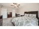 Large bedroom with desk, dresser and ceiling fan at 3070 Fareed St, Douglasville, GA 30135
