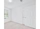 Clean, bright bedroom with large closet, carpet and natural light at 3227 Fescue Cir, Lawrenceville, GA 30044