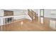 Bright living room featuring hardwood floors, a stone fireplace and plenty of light at 3227 Fescue Cir, Lawrenceville, GA 30044