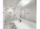 Modern bathroom with a large mirror, walk-in shower, and stylish fixtures at 3649 Peachtree Ne Rd # 305, Atlanta, GA 30319