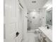 Bright bathroom with tiled shower, marble floors and a modern sink at 3649 Peachtree Ne Rd # 305, Atlanta, GA 30319