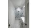 Modern bathroom with glass enclosed shower and marble countertops at 3649 Peachtree Ne Rd # 305, Atlanta, GA 30319