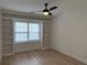 Bedroom featuring built-in shelving and a window at 3649 Peachtree Ne Rd # 305, Atlanta, GA 30319