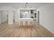 Open kitchen features an island with seating, modern appliances, and stylish pendant lighting above the island at 3649 Peachtree Ne Rd # 305, Atlanta, GA 30319