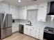Modern kitchen featuring stainless steel appliances, and shaker cabinets at 3649 Peachtree Ne Rd # 305, Atlanta, GA 30319
