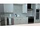 Updated kitchen with modern appliances and white cabinets at 3649 Peachtree Ne Rd # 305, Atlanta, GA 30319