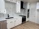 Modern kitchen with stainless steel appliances, quartz countertops, and ample cabinets at 3649 Peachtree Ne Rd # 305, Atlanta, GA 30319