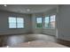 Bright living room with large bay windows and hardwood flooring at 3649 Peachtree Ne Rd # 305, Atlanta, GA 30319