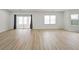 Bright living room features sliding doors and a large window, providing ample natural light and access to an outdoor space at 3649 Peachtree Ne Rd # 305, Atlanta, GA 30319